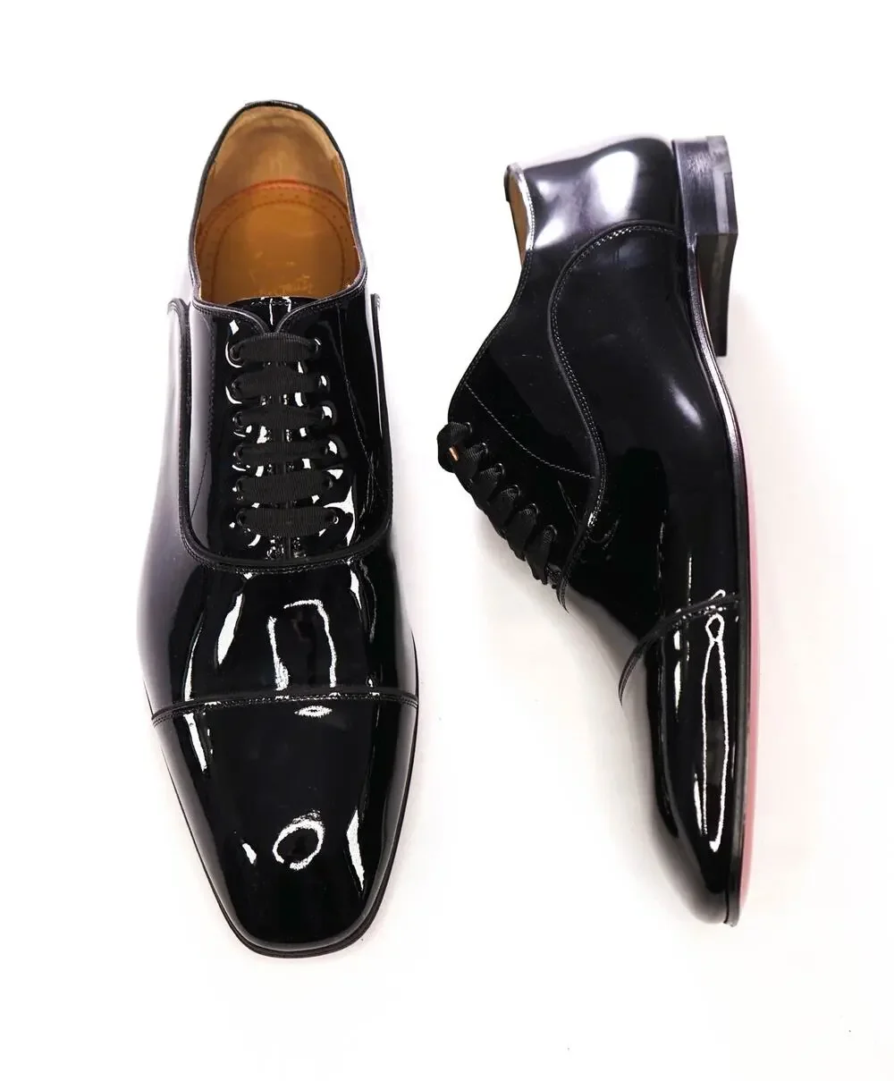$1,295 LOUBOUTIN - Black Patent 